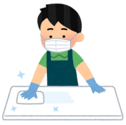 イラスト：マスクと手袋を着用した男性が、消毒のためにテーブルを拭いている様子